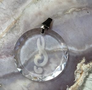 Clear Crystal Pendant with Music note.